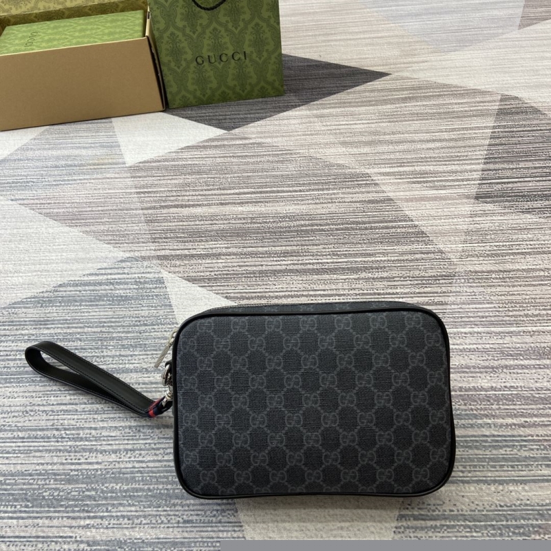 G*u*i clutch bags
